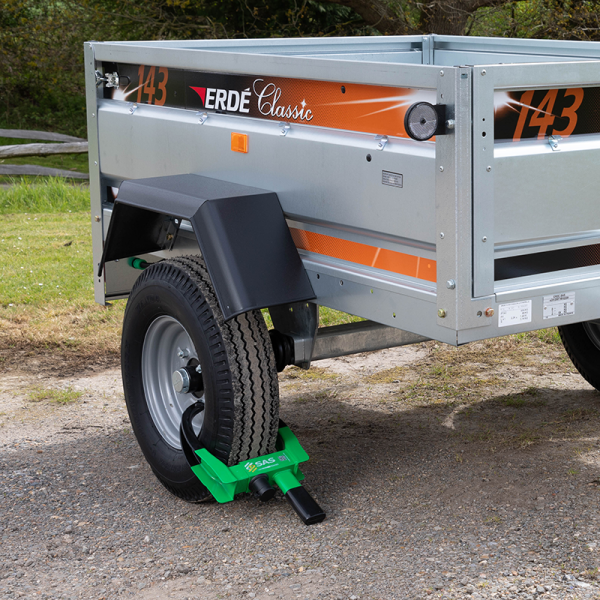 Erde camping utility trailer with green wheel clamp